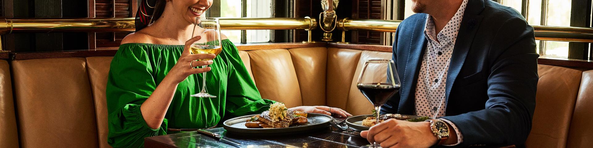 Couple enjoying Inside Dining at Jockey Club on Mackinac Island