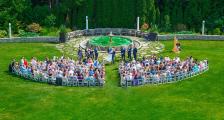 Guests sitting at a wedding on the lawn