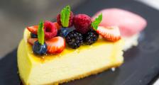 A cheesecake topped with berries