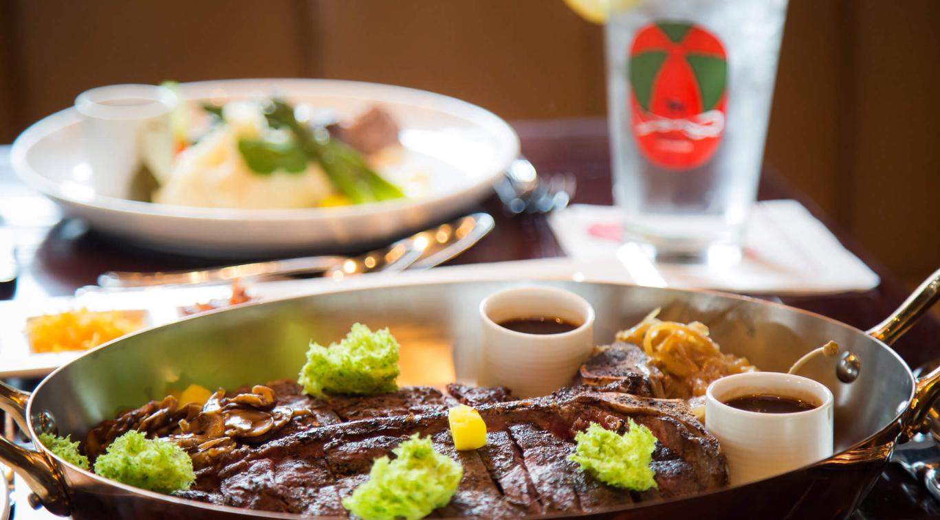 Dinner table with a steak