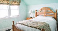 A bedroom in Masco Cottage