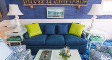 A blue sofa in the sitting room