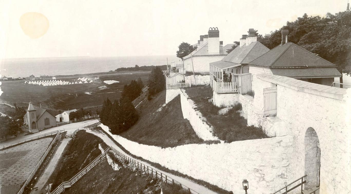 An old black and white photo of Fort Mackinac