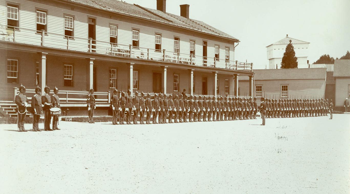 An old black and white photo, the interior of Fort Mackinac