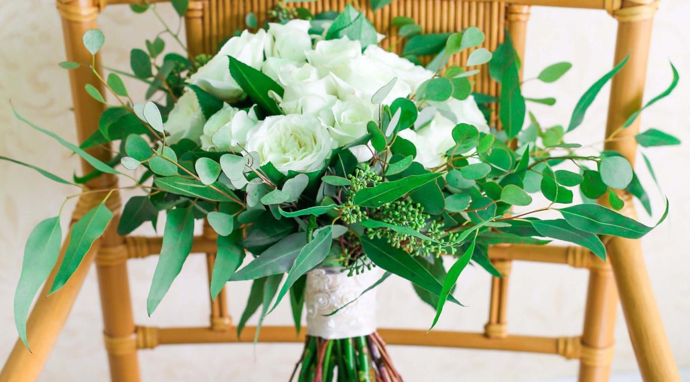 A bridal bouquet on a chair