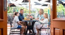 Family enjoying a meal at The Gate House.