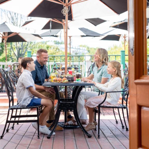 Family enjoying a meal at The Gate House.