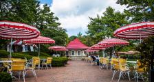 The Jockey Club at the Grand Stand seating outdoors
