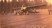 An old photo of an airplane labelled 