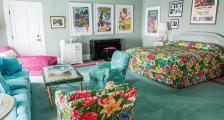 Esther Williams Suite with bed and living room furniture