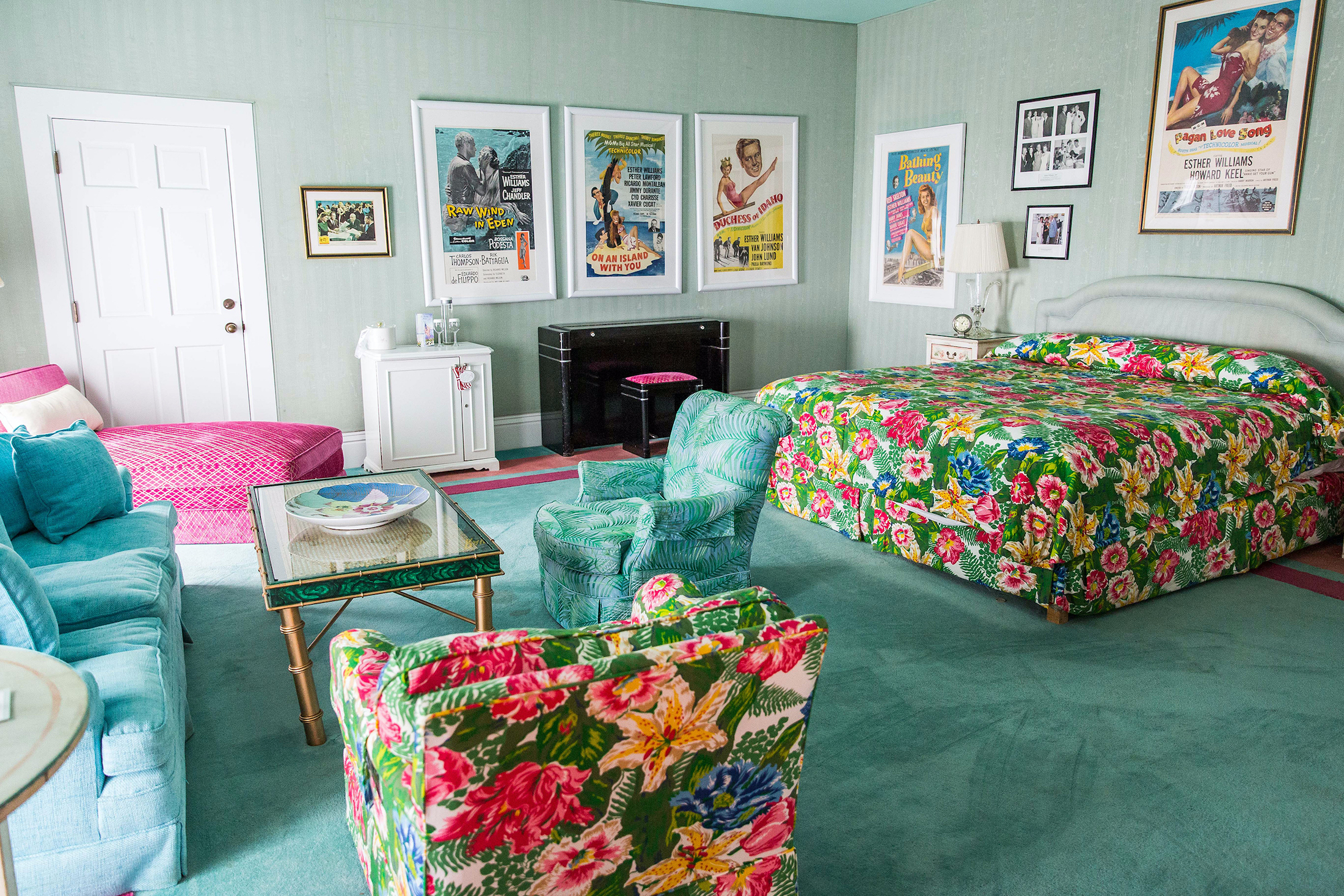 Esther Williams Suite with bed and living room furniture