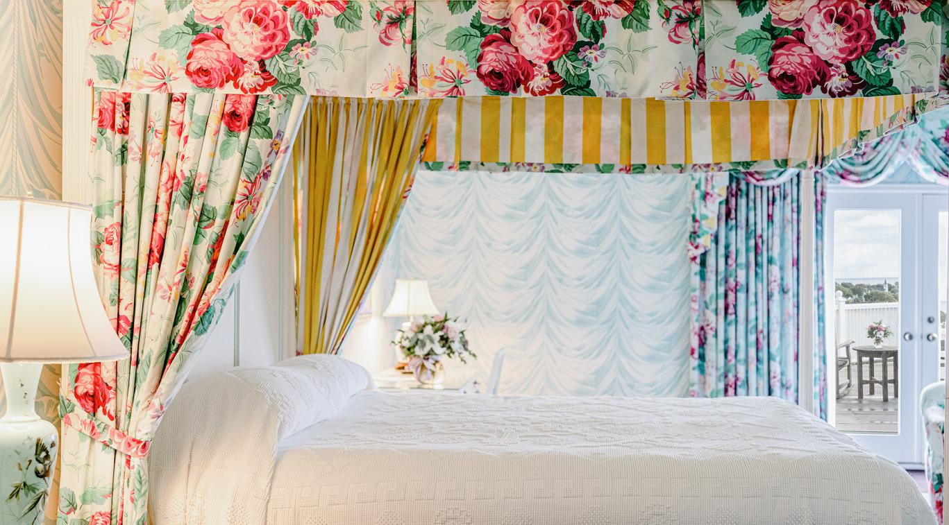 Guest room with floral canopy
