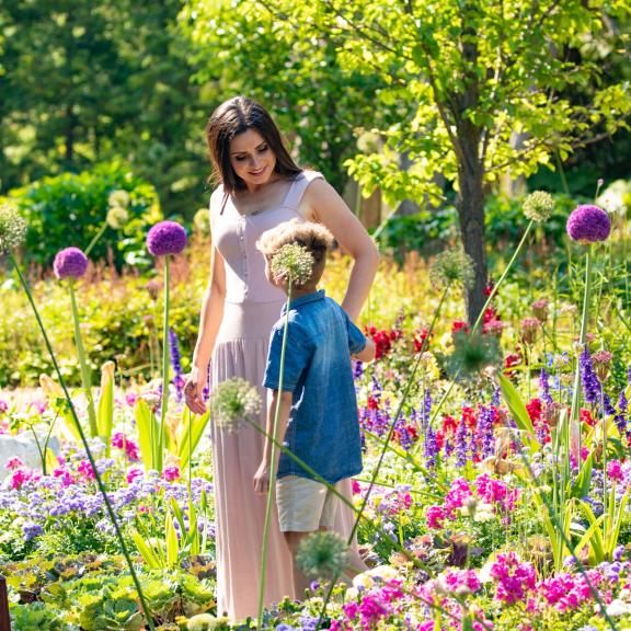 mother and son in flowers