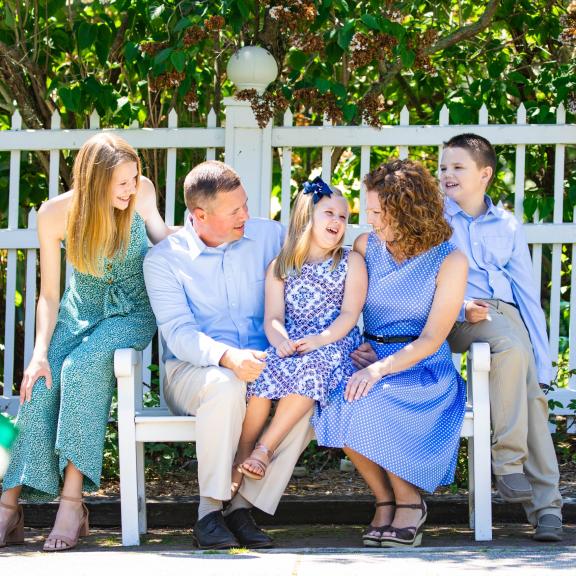 Family sitting on bench