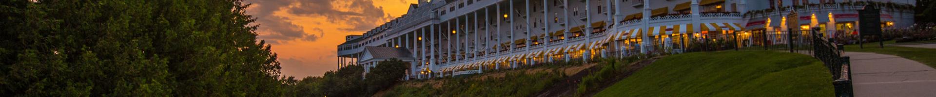 View of grand hotel at sunset