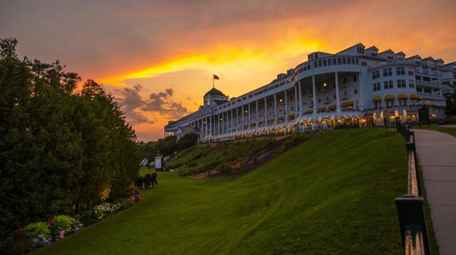 View of grand hotel at sunset