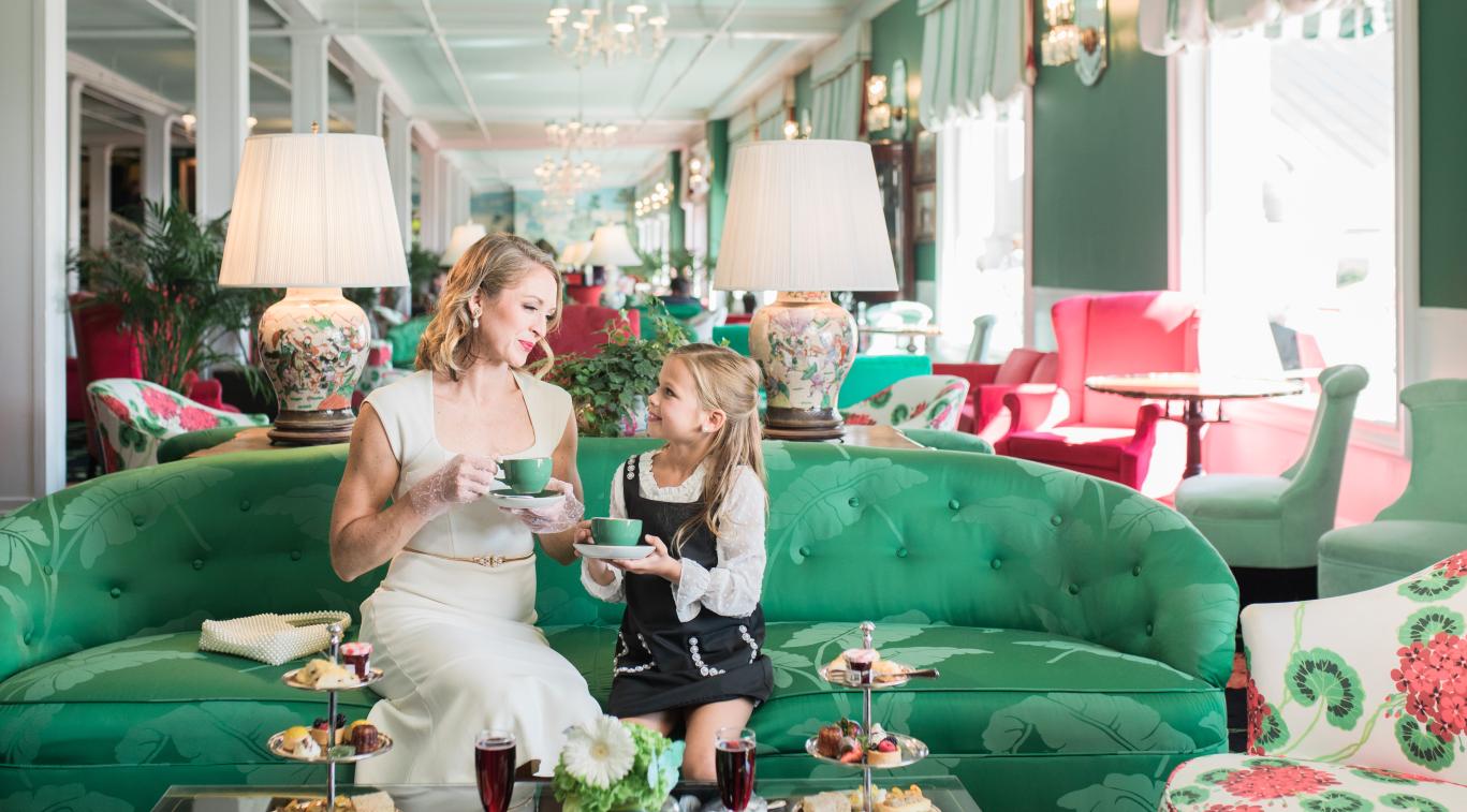 Girls Enjoying afternoon tea in the parlor at Grand Hotel