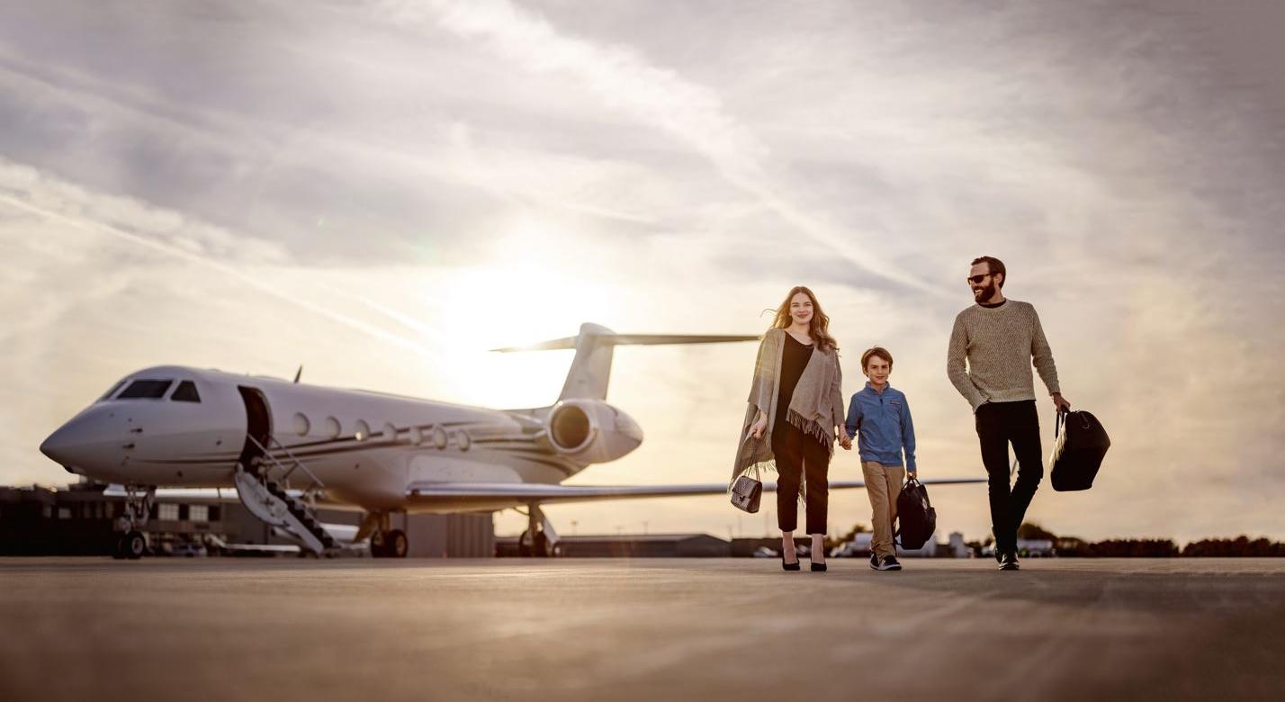 Family leaving Pentastar Private Aircraft